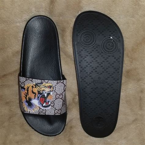 tiger gucci fli flops